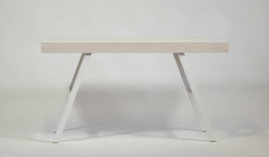 A white table with two legs on top of it.