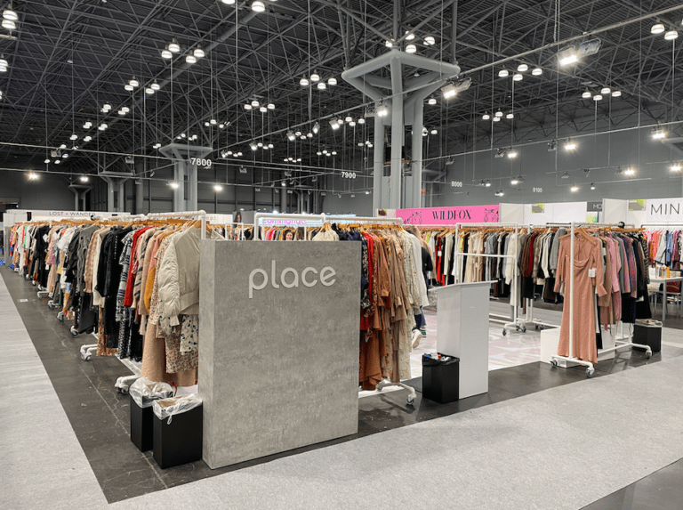 A large room with many clothes on display.