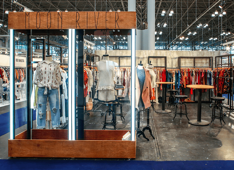 A store with several different types of clothes on display.