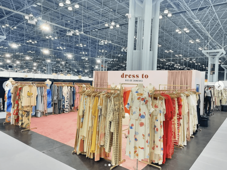 A room filled with lots of dresses on display.